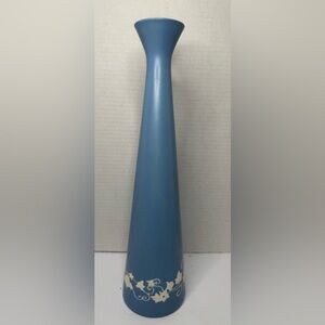 Handmade antique blue vase with white flowers painted all around the bottom